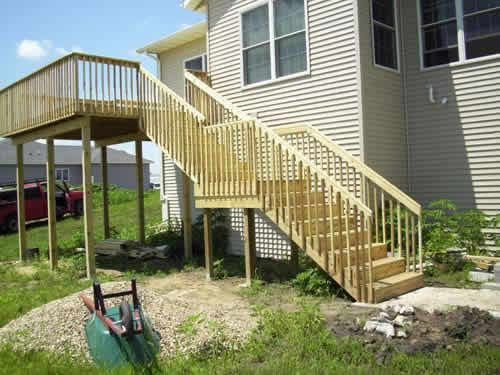 basic constructed deck finished with steps and handrails - Cedar Falls, Iowa