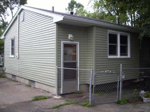 Nate Phillips construction company repaired a waterloo iowa house with new siding and new window installation